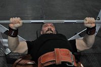 Jonathan Evans completes a bench press during the Big Kahuna bench press competition at Camp Zama, Japan.