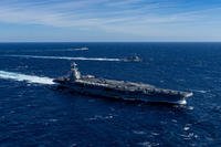 The USS Gerald R. Ford sails in formation